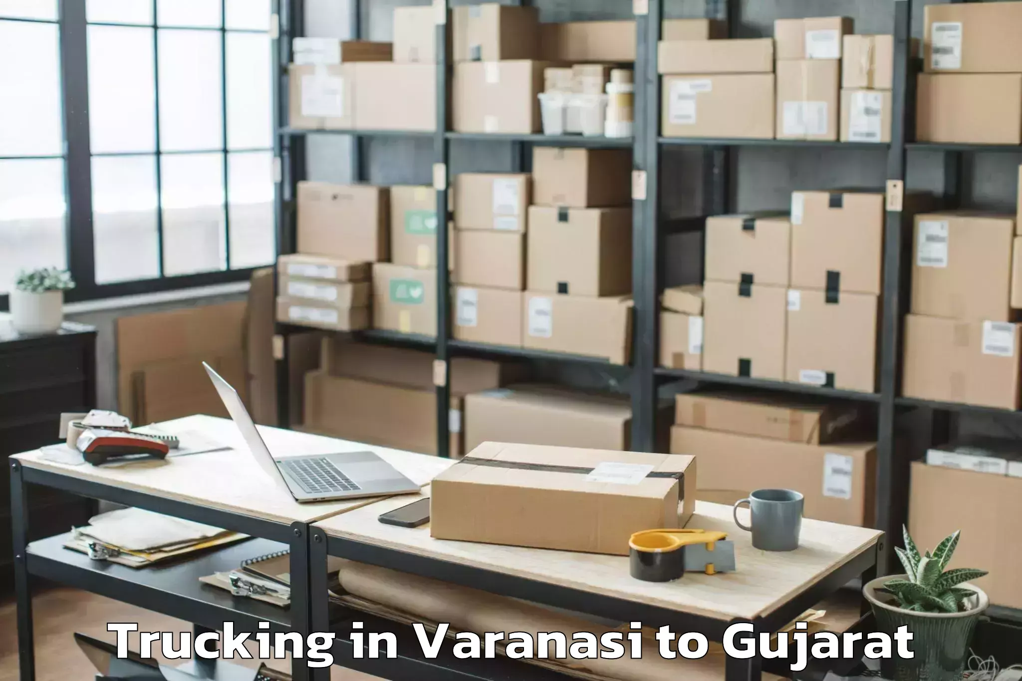 Varanasi to Kathlal Trucking Booking